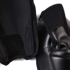 Fairtex Twister Detachable Shin Guards Black 16 Fairtex Twister Detachable Shin Guards Black -BOXING GLOVES Shop fairtex.shin .twister.black .6